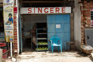 Click to enlarge: Roadside Shops 1 [f/9, 1/160 sec, 22mm-e, ISO 200, Sony A700]