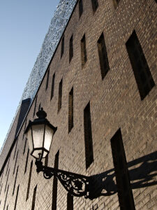 Old Streetlight On A Modern Wall
