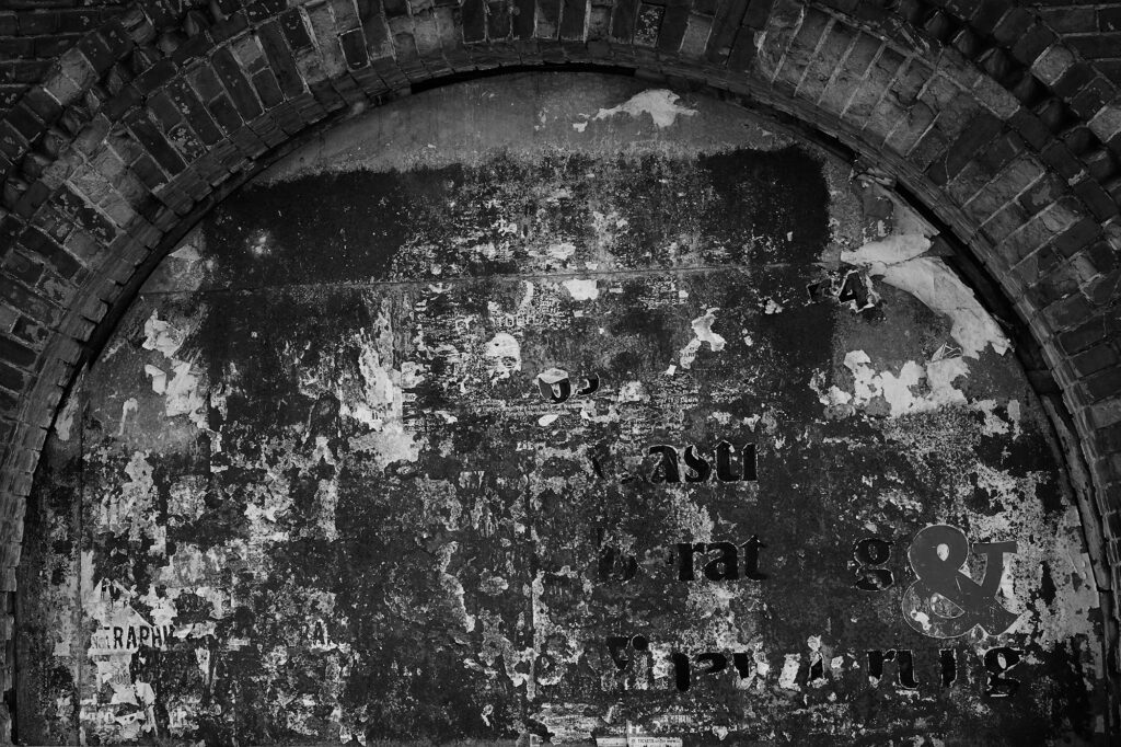 Long stories, gone. Torn posters on a board, filling a former window. Schnellerstraße 20A, Berlin, geotagged, Black & White, Common Places, Urban