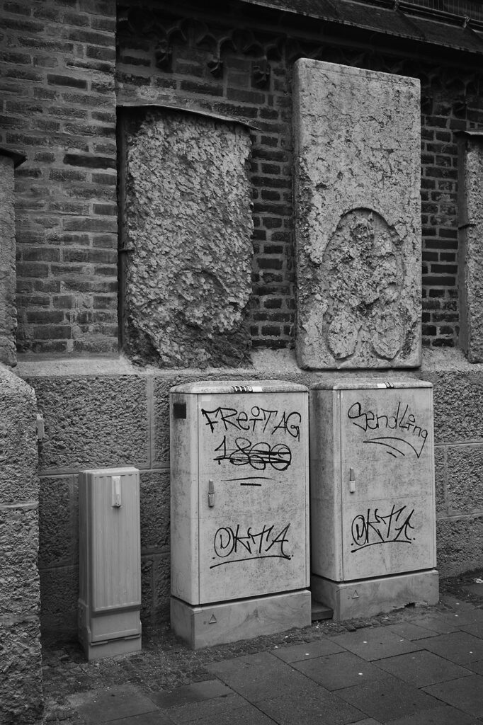 Steles on a Church Wall, Frauenkirche, Munich, Black & White, Urban