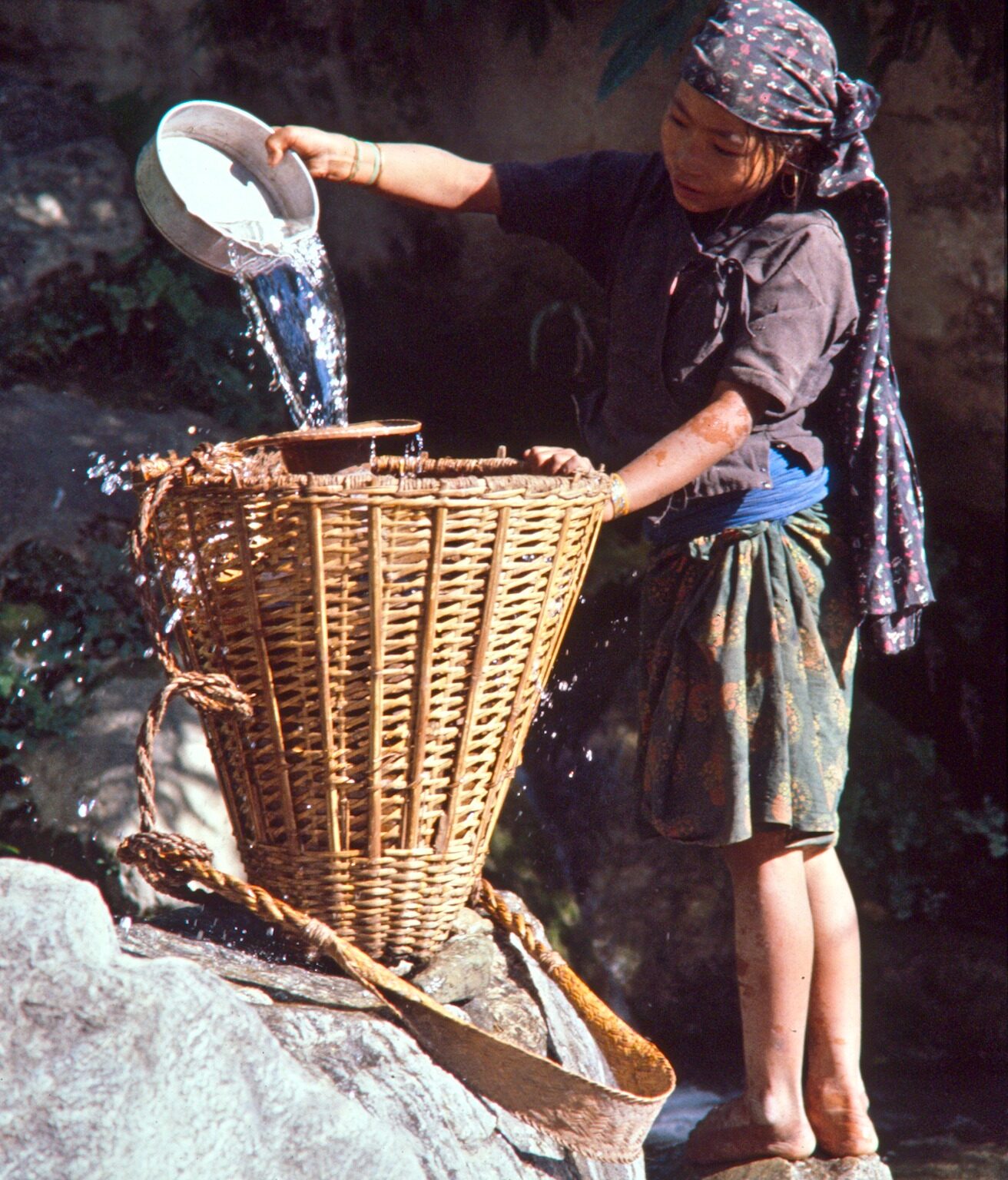 Girl filling Water Container