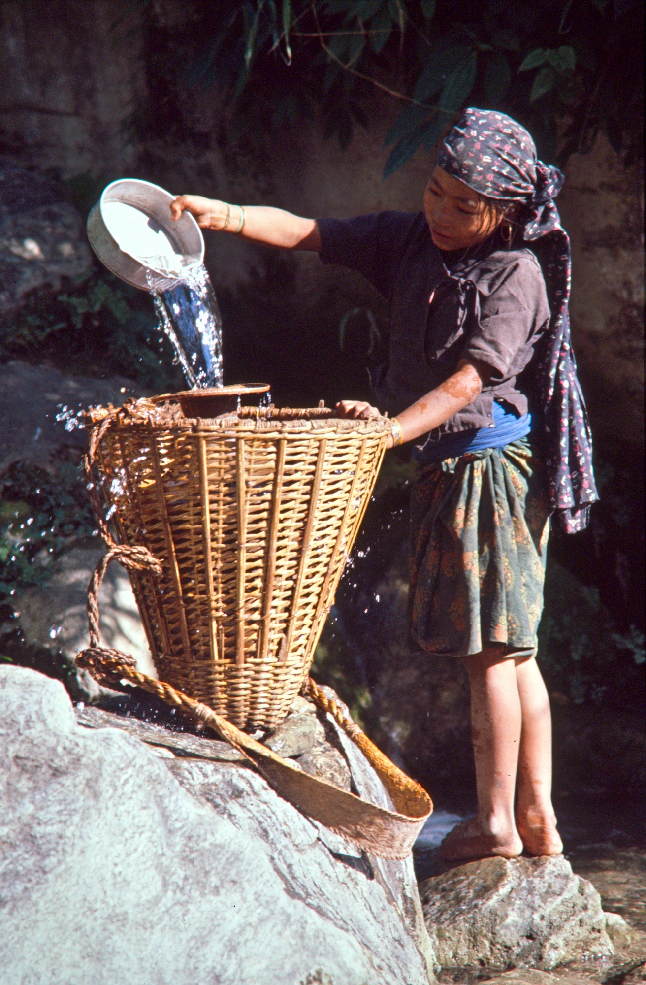 Girl filling Water Container