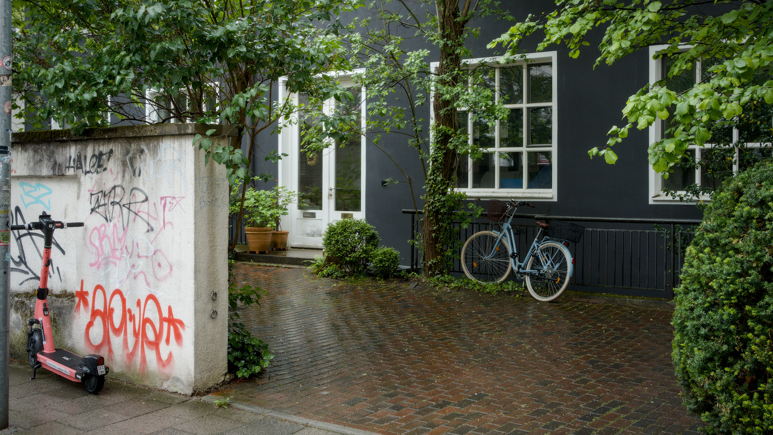 Scooter and Bike in Rain