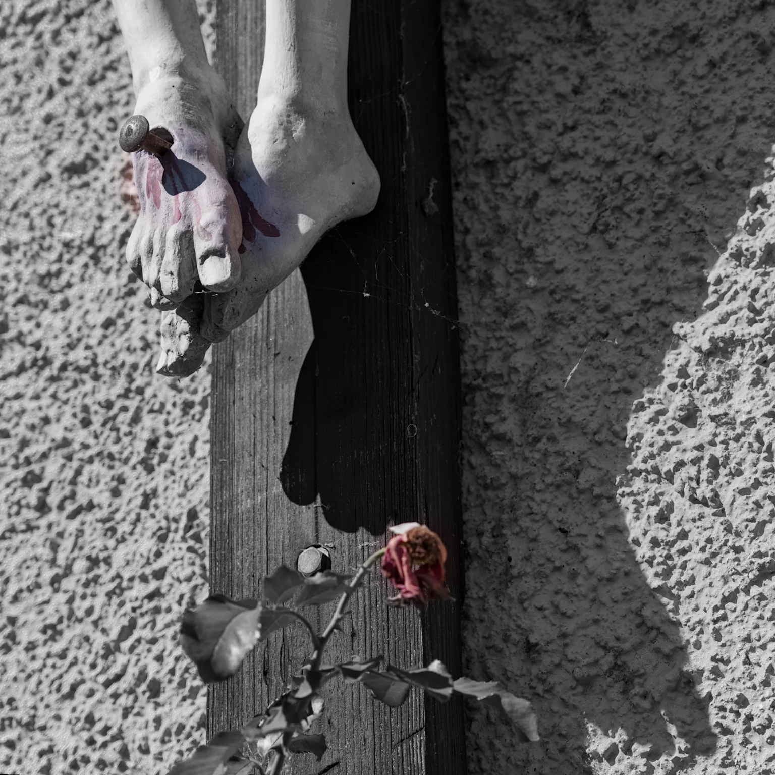 the feet of the crucified Jesus