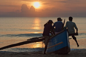 fishermen at sunrise