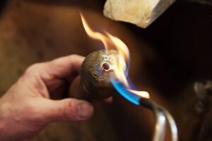 heating to remove from the resin