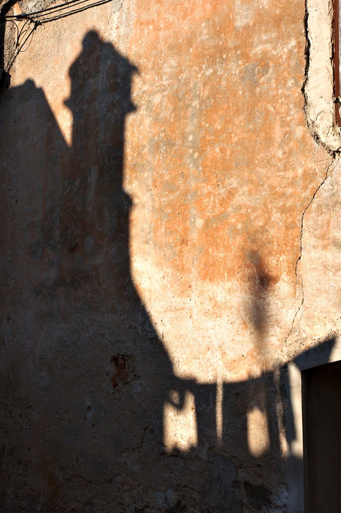 shadows on the wall, and power lines